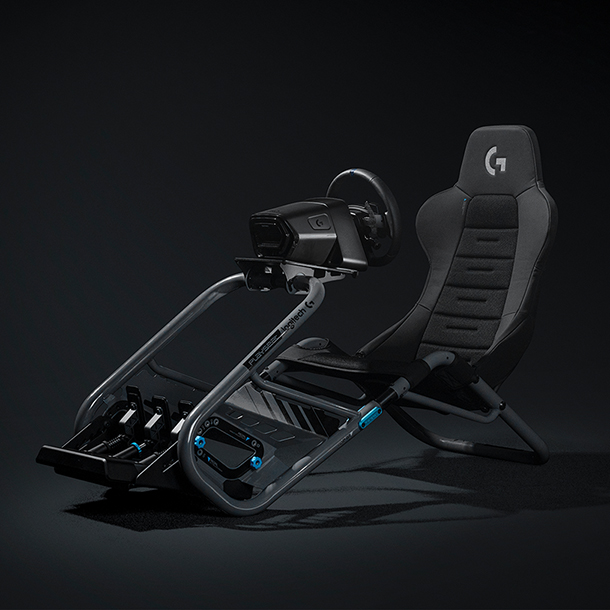  A racing simulator cockpit that offers a fully adjustable cockpit including an adjustable seat, pedal plate and steering plate. Lightweight, yet rigid and robust, the simulator is made from a combination of powder coated carbon steel, anodized aluminum parts and high quality PU leather with a patented ActiFit material.